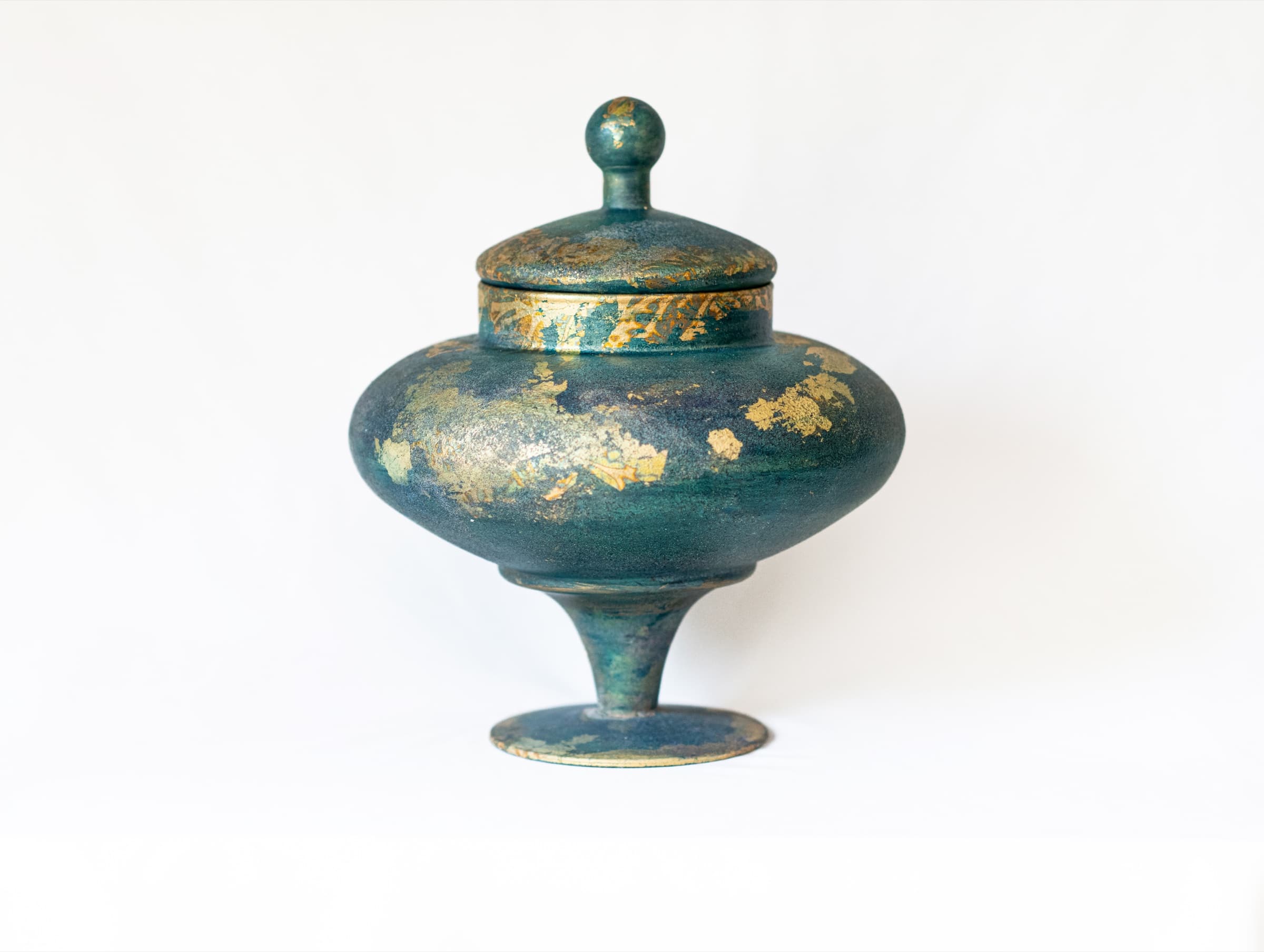 Rounded teal and gold artist-made memorial vessel by Denise Caliva